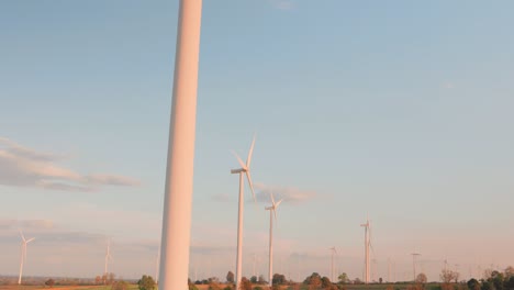 panorama of windmill farm fields produce clean energy and sustainable