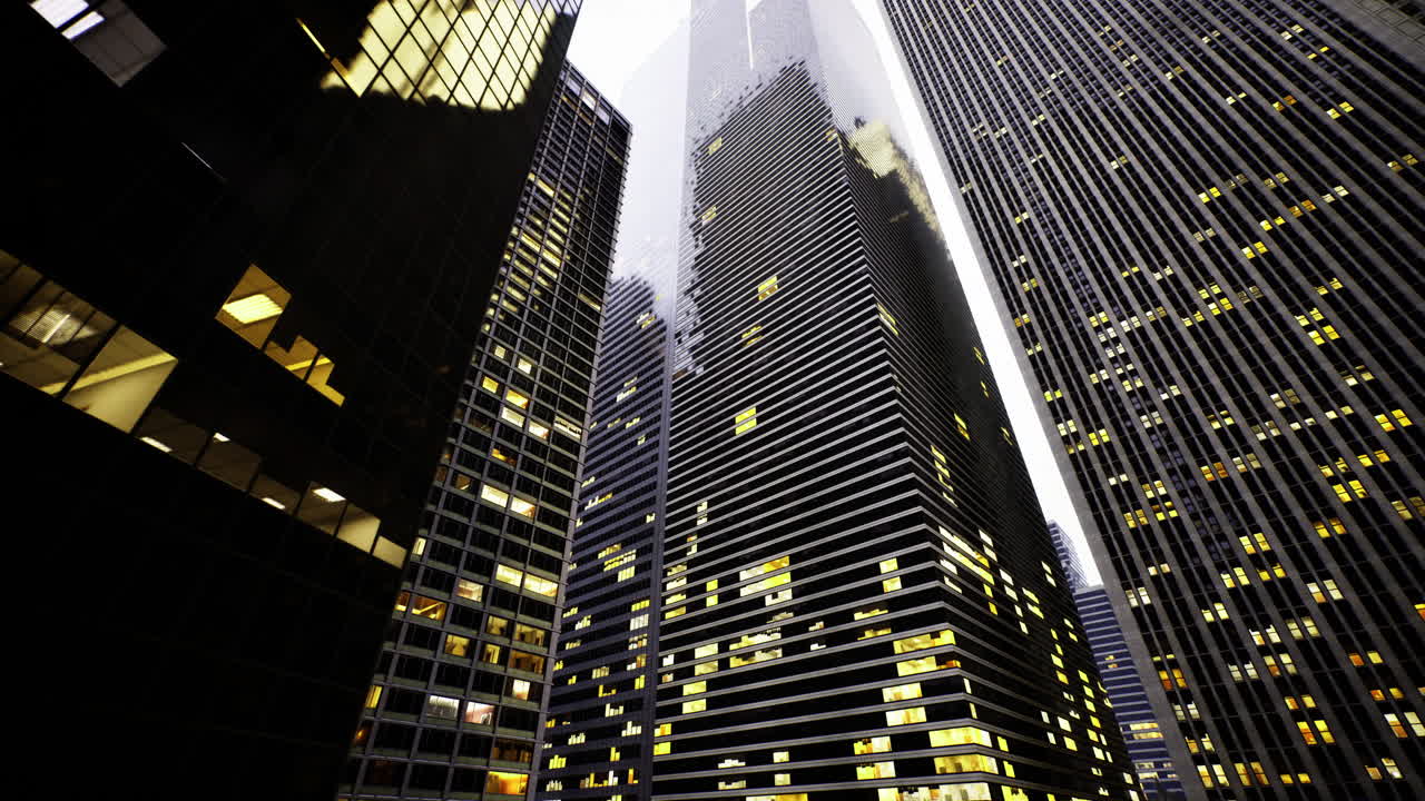 vista del horizonte de la ciudad que muestra edificios altísimos al anochecer con luces vibrantes