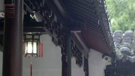 slow motion with rain drops from the china ancient temple eave