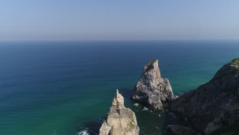 aerial view of praia da ursa is a deserted beach located in sintra, portugal