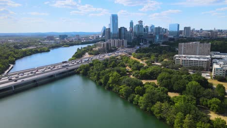 drone flying towards rush hour traffic in austin, texas