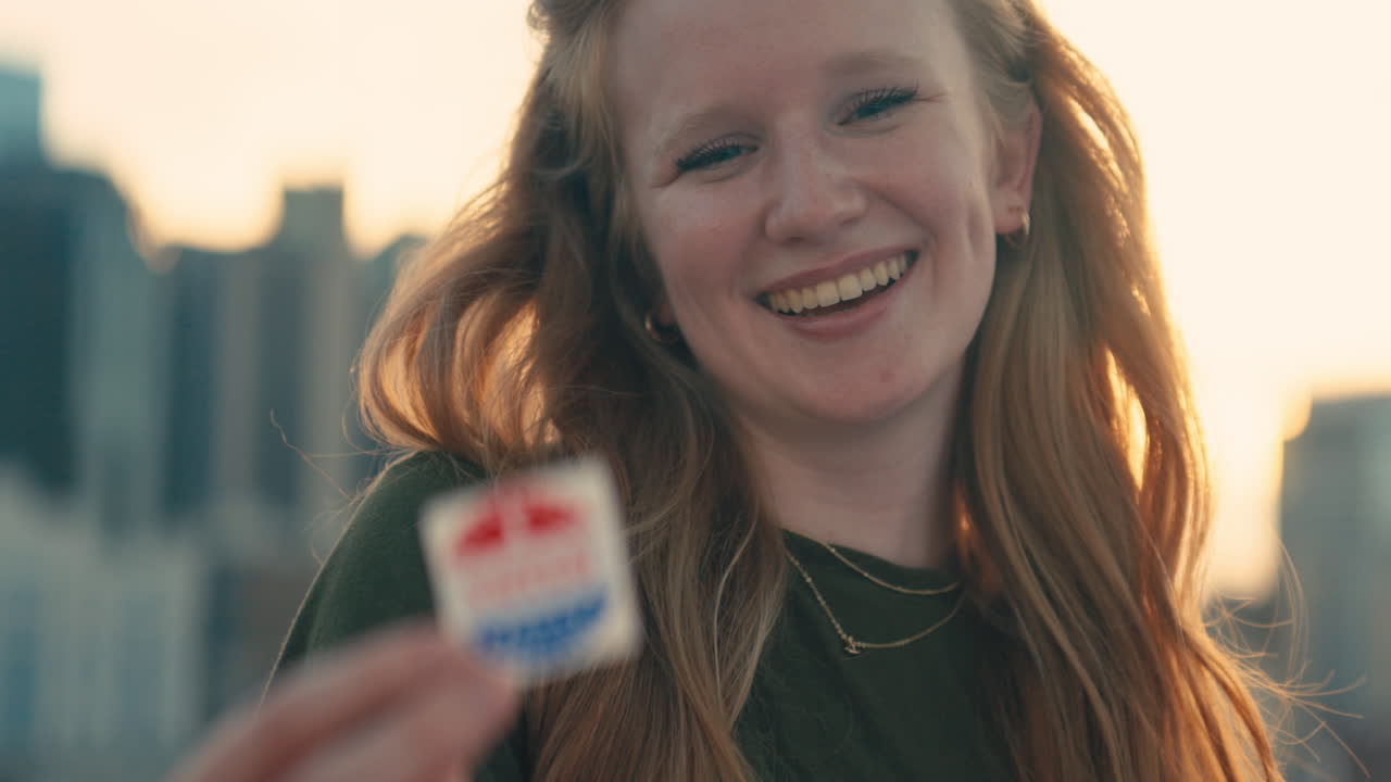 Woman showing voting sticker