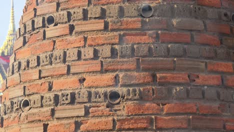 ancient brick structure with smoke and incense