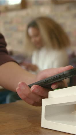 close up of contactless phone payment 02