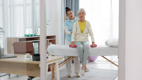 physiotherapy, senior woman with dumbbell