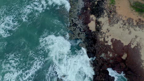 Waves-splashing-on-sea-shore-rocks