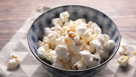 a bowl of buttery popcorn