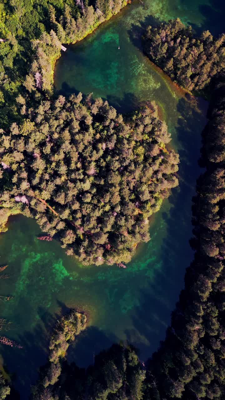 Flying vertically over Antu Sinijarv the drone reveals the lake’s unique blue and green hues surrounded by untouched forest making it one of Estonia’s most beautiful natural gems