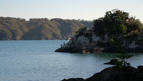 Famous-Perry-black-ship-returning-to-harbor-in-Shimoda,-Izu-Peninsula