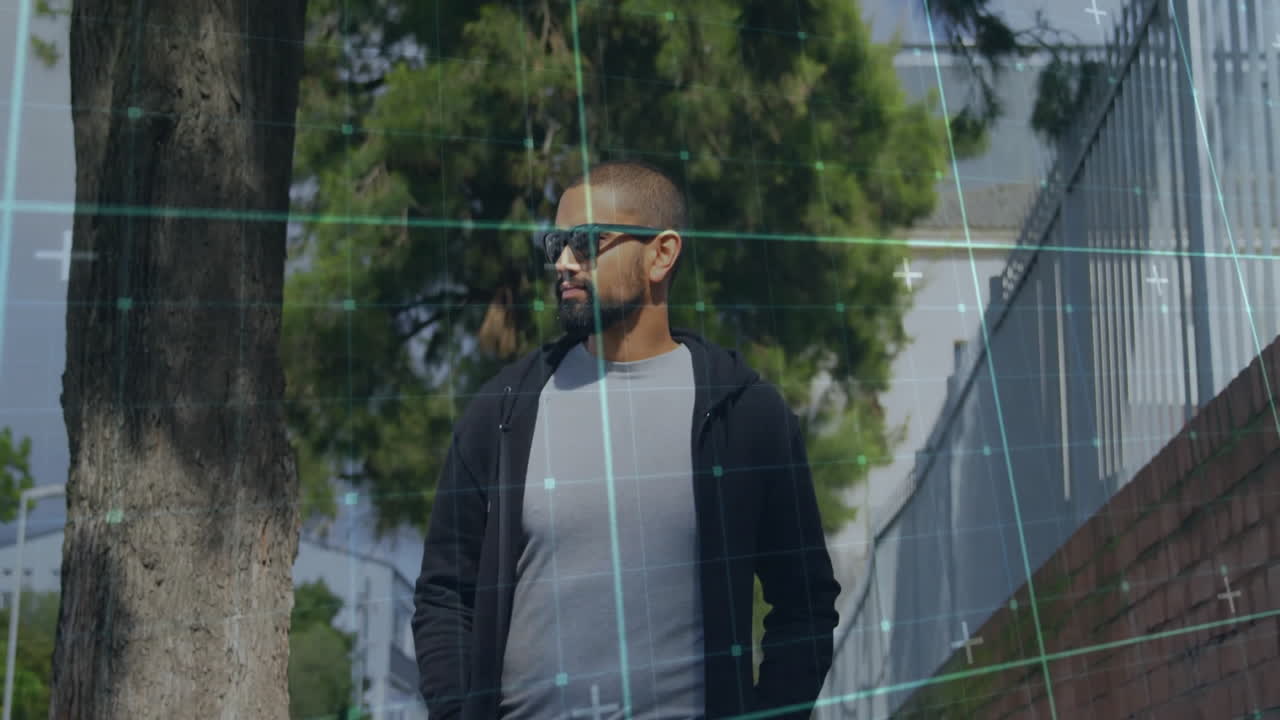 Man walking outdoors with grid lines and data points animation over scene