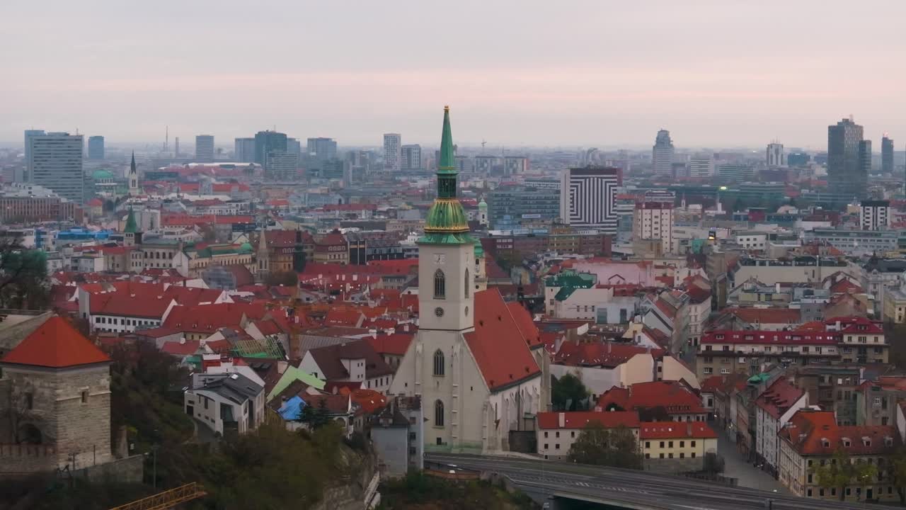 4K cinematic drone footage of St. Martin’s Cathedral in Bratislava, revealing the architectural beauty, bustling surroundings, and historic atmosphere of central Bratislava._024