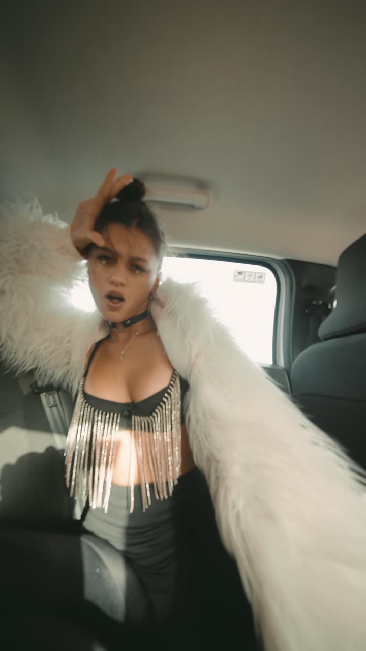 Stylish woman in car