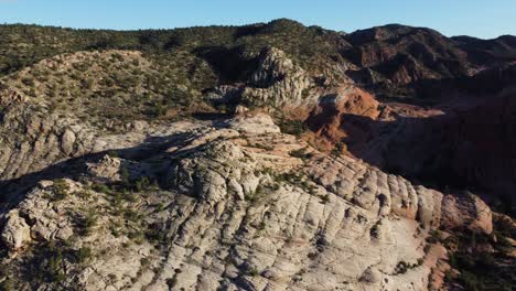 panaromic jib view of the drone over the rocky mountains