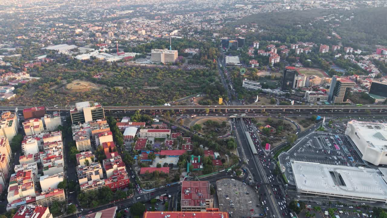 Drone view of avenues and second levels crossing southern Mexico City