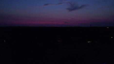 early assending sunrise with vibrant lavendar purple and gray colors