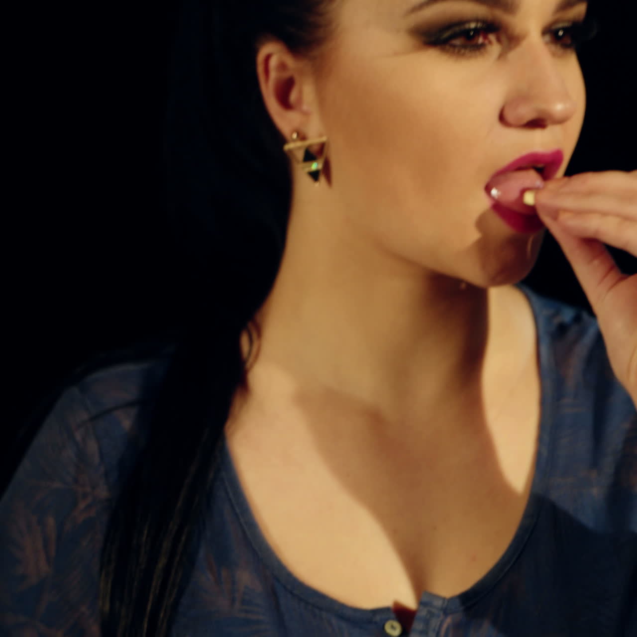Young woman taking pills. Vitamin, anesthetic, antibiotic.