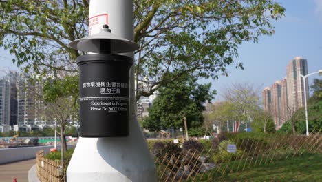 air quality filter experiment tied to lamppost in local park in tseung kwan o, hong kong