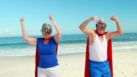 senior couple pretending to be superhero