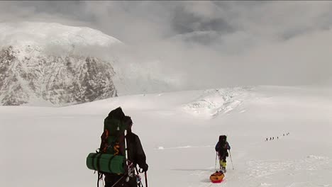 Climbers-headed-out-over-snow