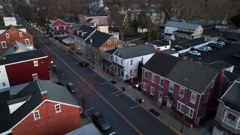 Aerial-approaching-shot-of-american-small-town-with-colorful-houses