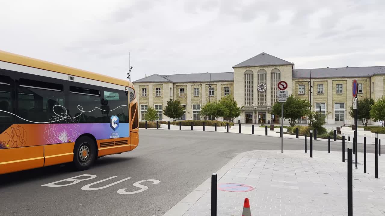 Bus arriving at the train station in a French city