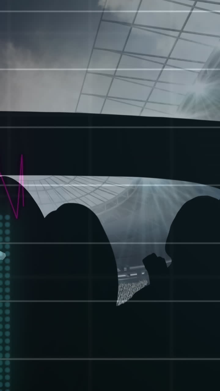 Animation of graphs and data processing over cheering sports fans at stadium