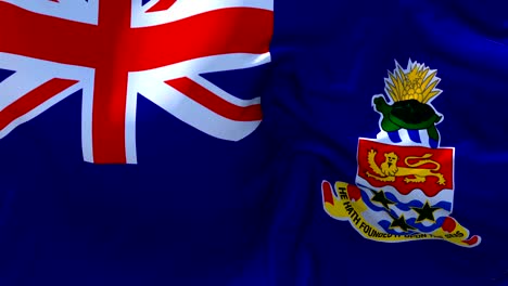 cayman islands  cayman islands flag waving in wind slow motion animation . 4k realistic fabric texture flag smooth blowing on a windy day continuous seamless loop background.