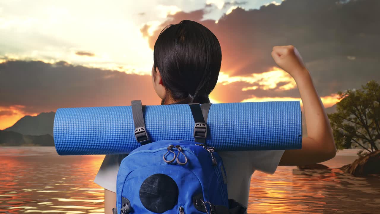 Close Up Back View Of A Female Hiker With Mountaineering Backpack Screaming Goal Celebrating The Success At A Lake
