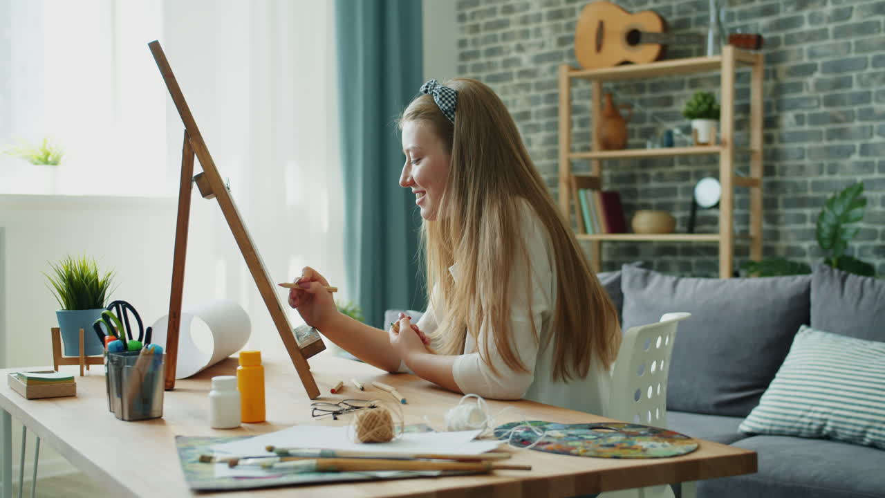 Young Girl Drawing at Home