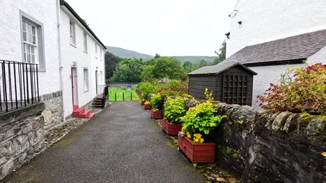 scenic garden path beside historic building