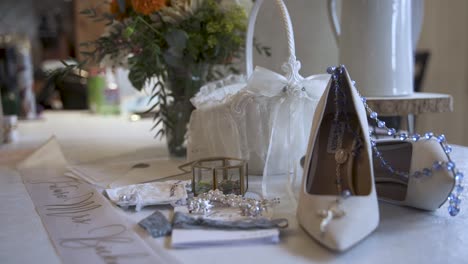 wedding day concept - elegant setup of pretty decorative bridal shoes