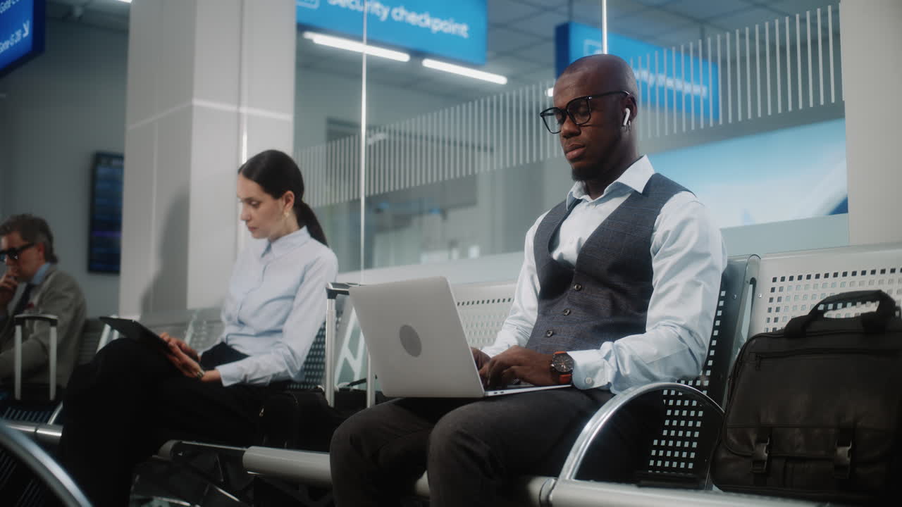 Business Travelers Waiting in Airport