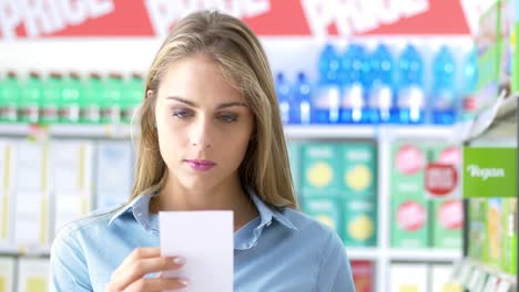 woman checking a shopping list