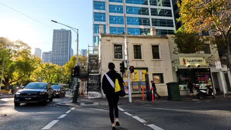 people crossing street in melbourne, australia