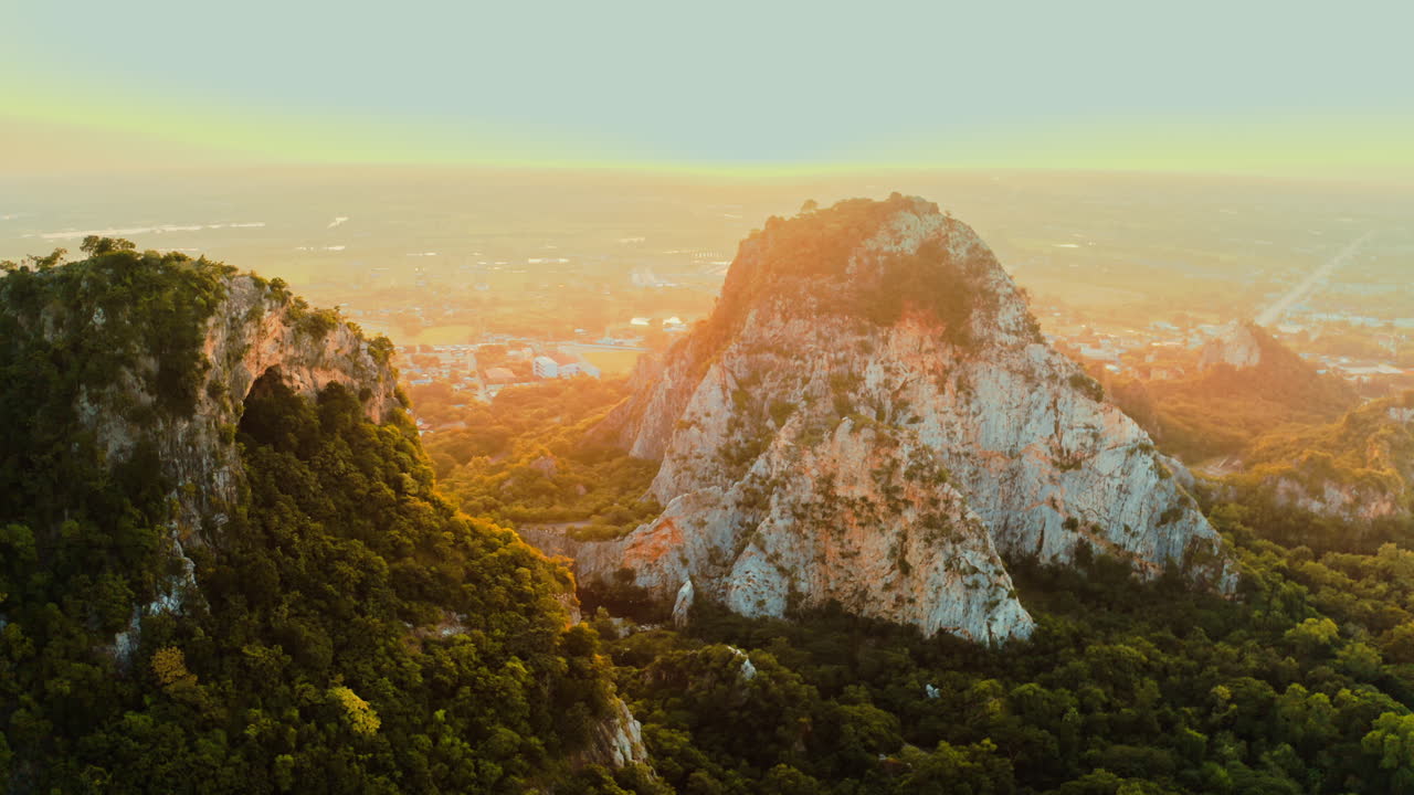 Sunrise or Sunset Over Mountainous Landscape