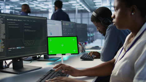 team of diverse engineers working in a modern data center