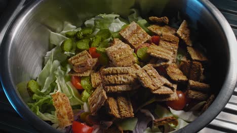 Preparing-a-healthy-tuna-salad-in-a-metal-bowl