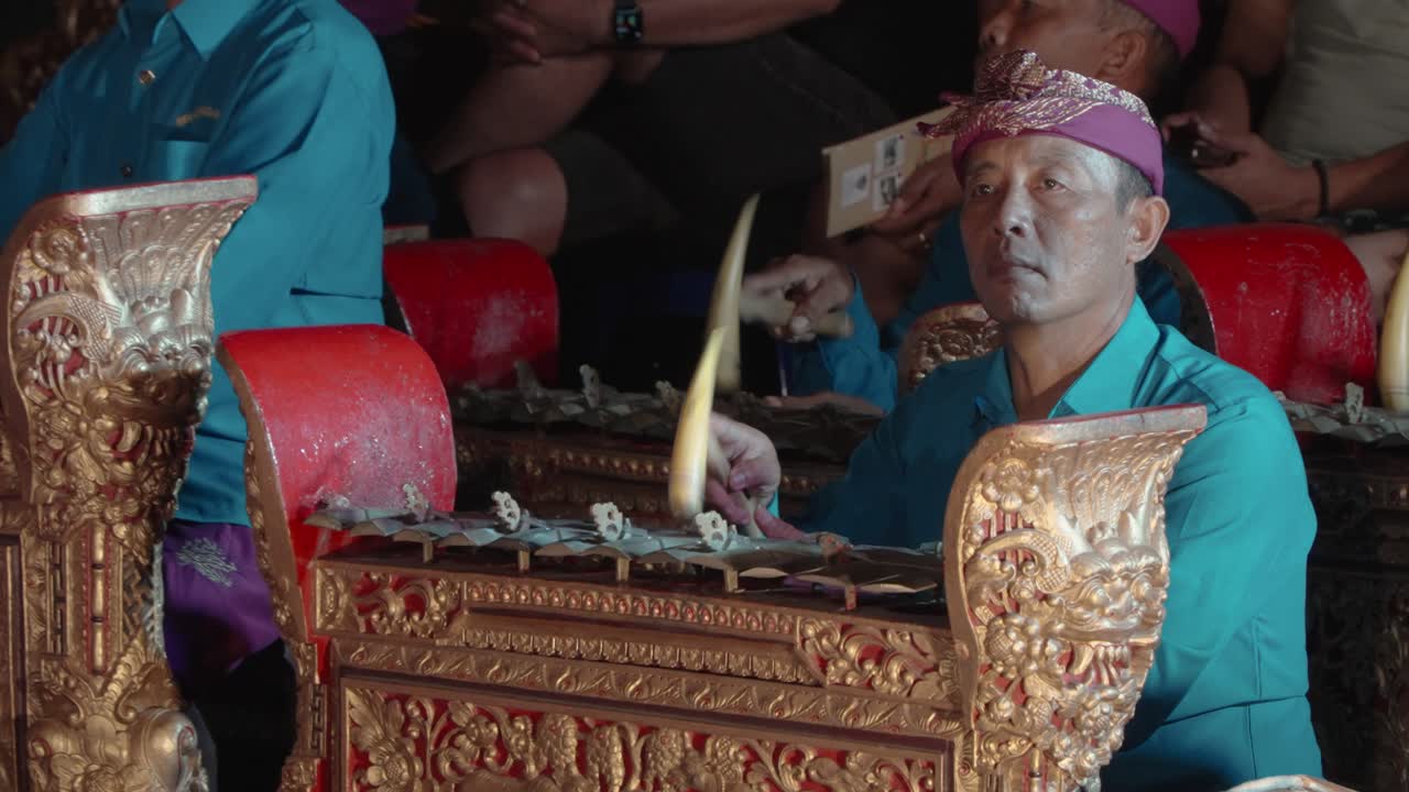 Close-up of Skilled Musician Playing on Gangsa Metallophone Instrument at Ubud Palace, Bali