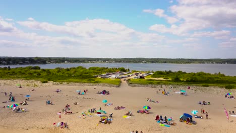 shot from above of tourists on beach. burlingame park, charlestown. united states