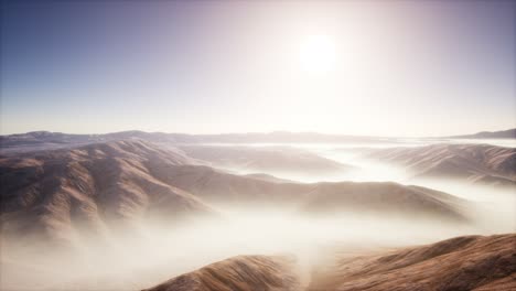 mountain landscape with deep fog at morning