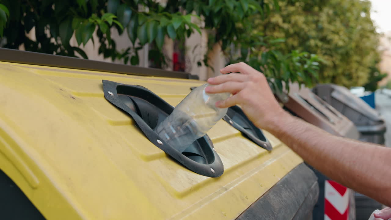 Recycling plastic bottles in a waste bin