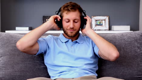 man listening to music and relaxing