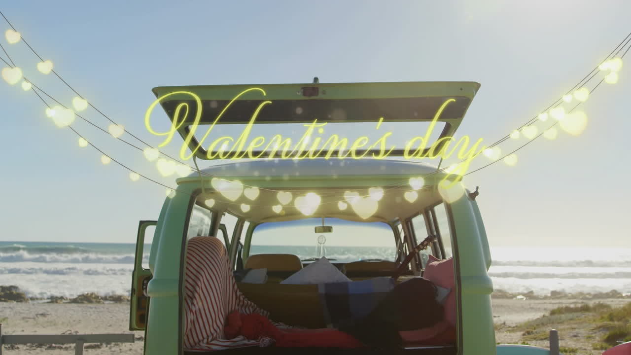 Van by beach decorated with heart lights and Valentine's Day animation