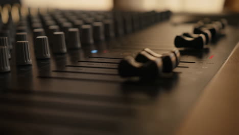 close-up of a professional audio mixer