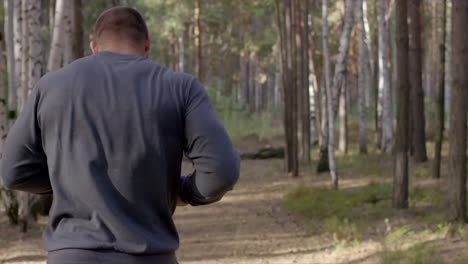 man hiking in the forest