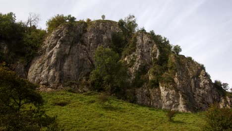 mid shot looking back up the dovetail walk of a rocky outcrop of rocks, crag, rockface