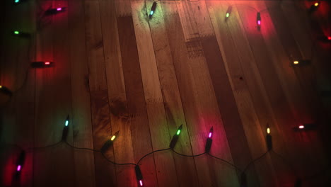 Animated-closeup-colorful-garland-on-wood-background-2