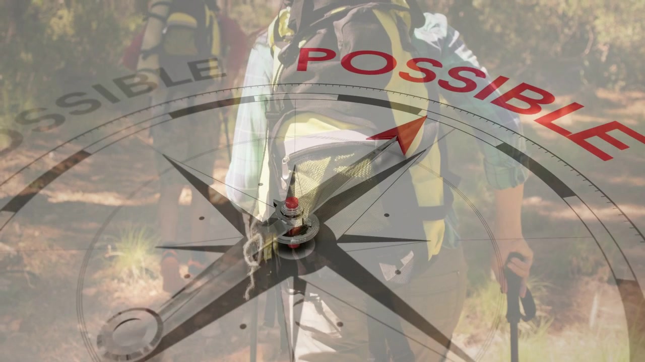 Hikers walking woods trail as compass overlay growing needle turning toward POSSIBLE guiding travel