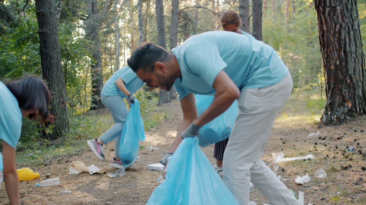 Community Volunteers Cleaning Up a Forest