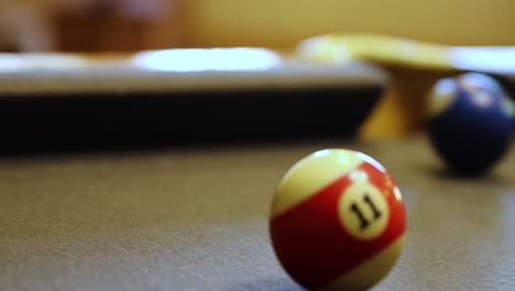 playing billiard - ball rolling and hitting other balls on the pool table